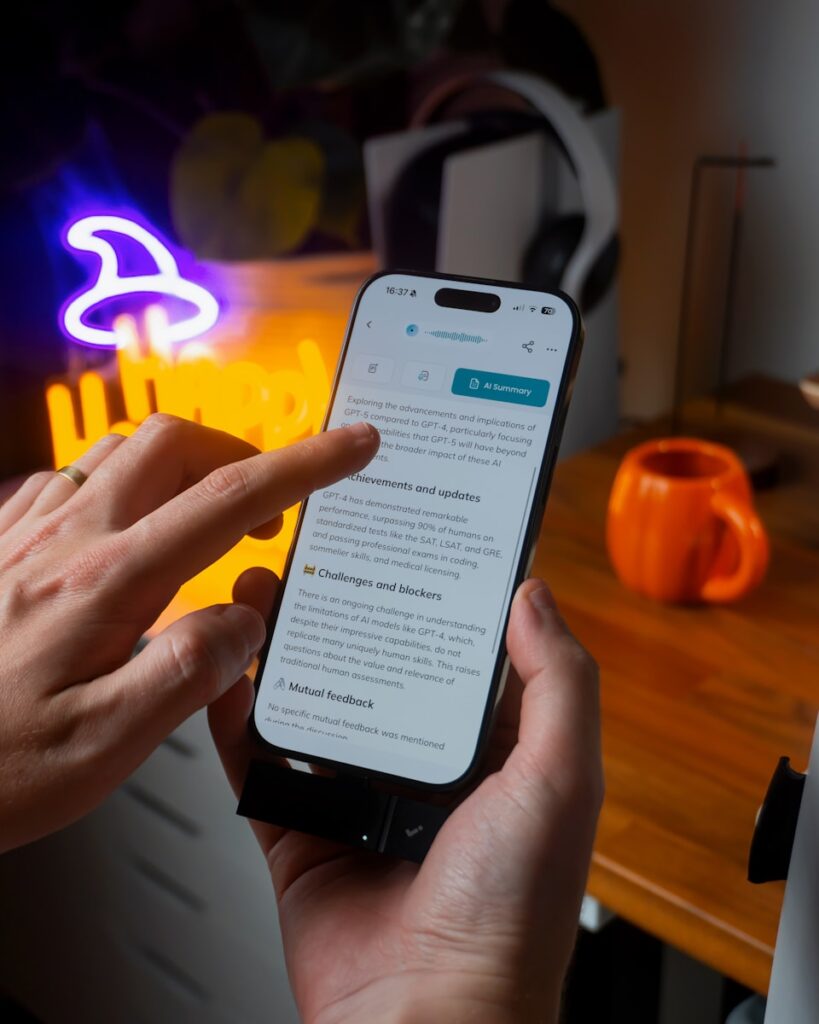 Hands holding smartphone with text on screen