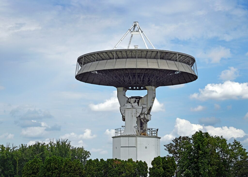 Large radio telescope against a cloudy sky