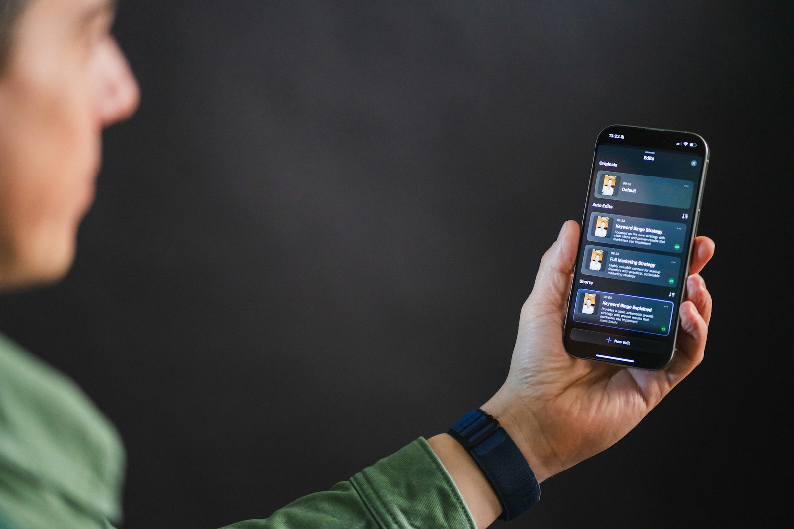 Bernie Sanders and AI Reckoning the Most Consequential Technology Man holding smartphone with app interface