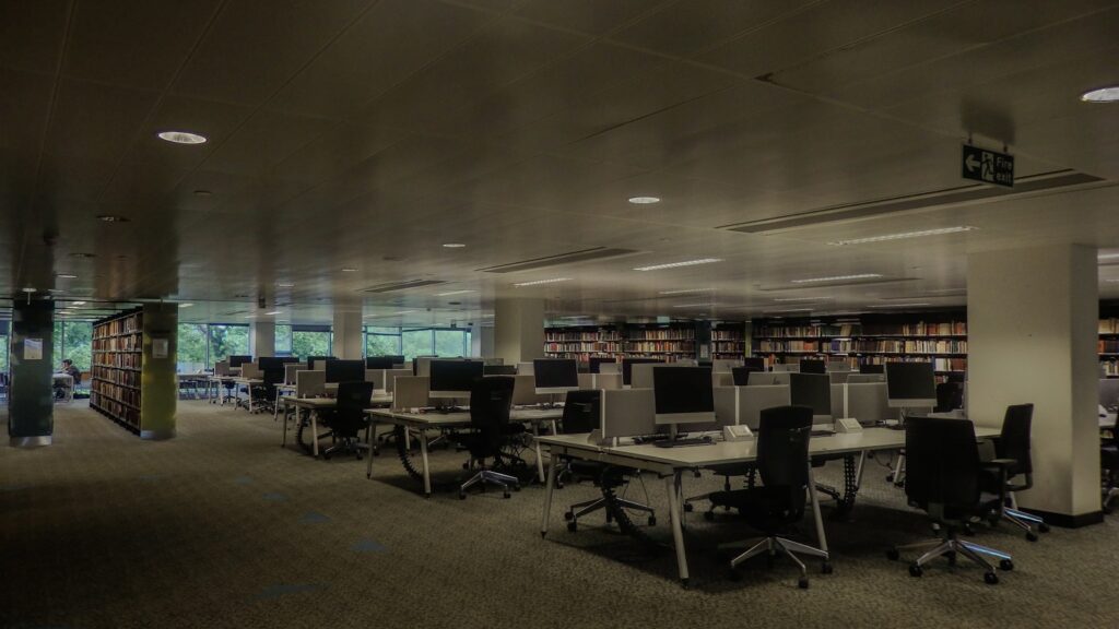 Oracle’s Data Center New Setback Shakes Tech Stocks A library with computers and books.