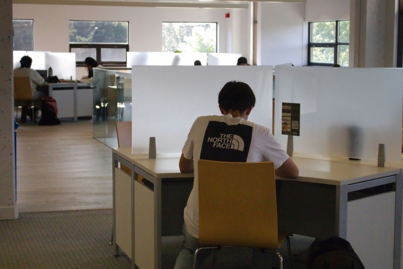 AI Young Office Careers the New Path for Next Generation A person sitting at a desk with a laptop