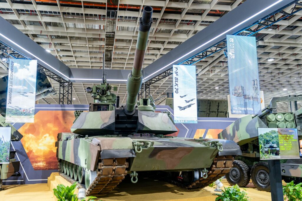 A modern military tank with camouflage pattern.