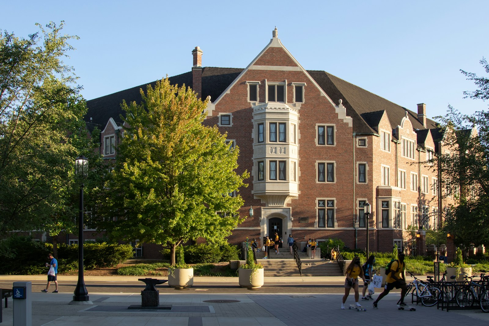 Why Purdue’s New Requirement Signals a Turning for College Education people walking on street near brown concrete building during daytime