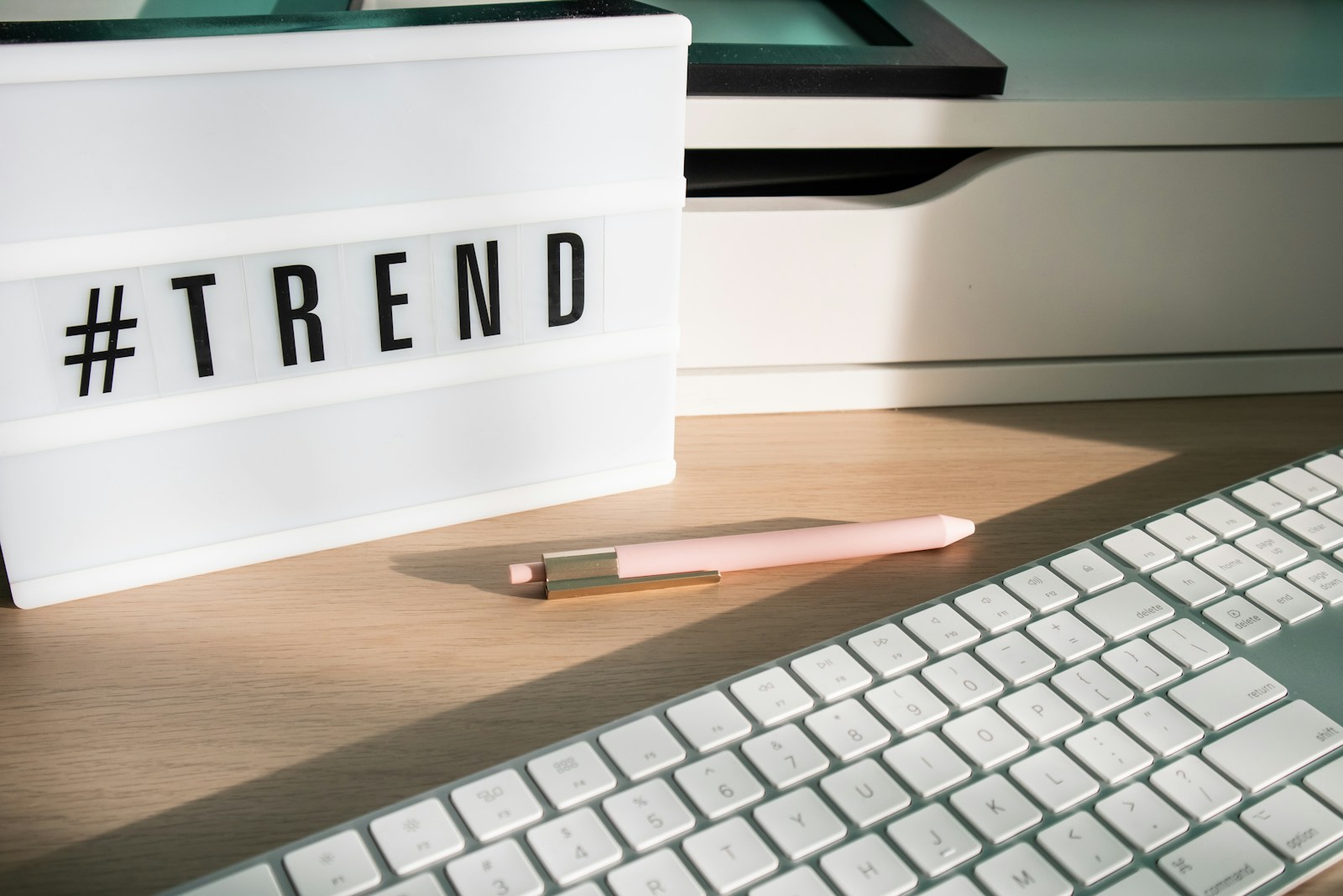 Why Tender Offers Like Clay’s Are Redefining Who Really Wins in New Tech a keyboard and a pen sitting on a desk