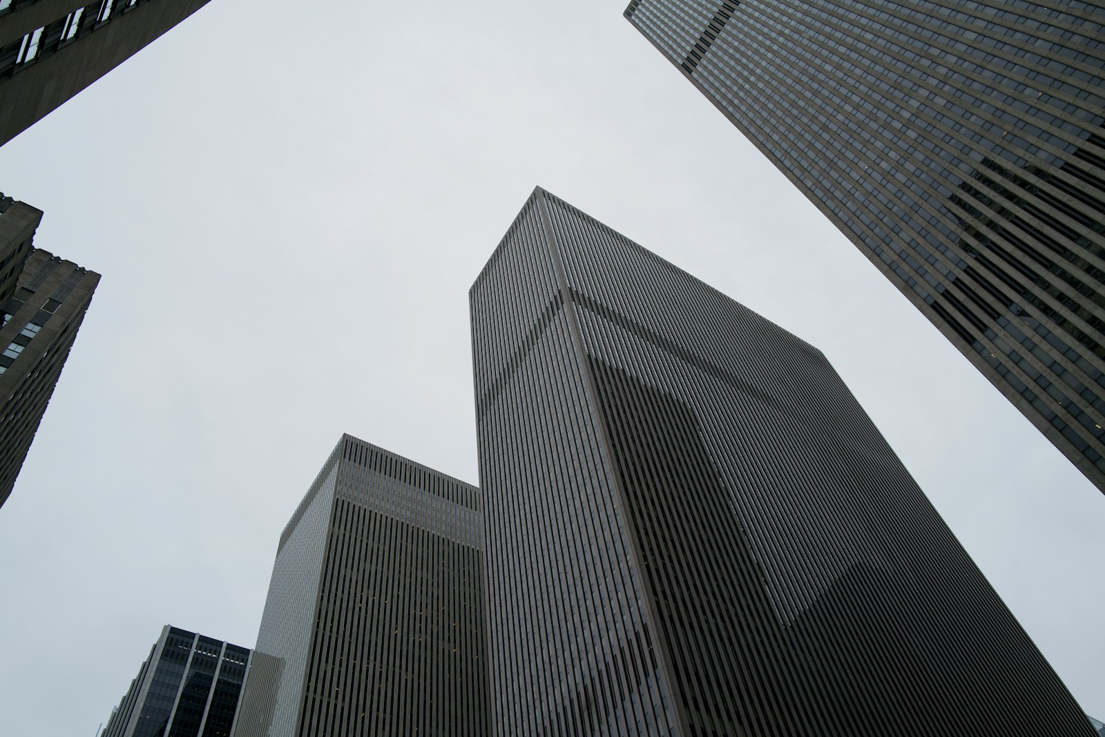 Why Companies Borrowing Billions to Chase the New Future Intelligence Looking up at tall buildings in a city