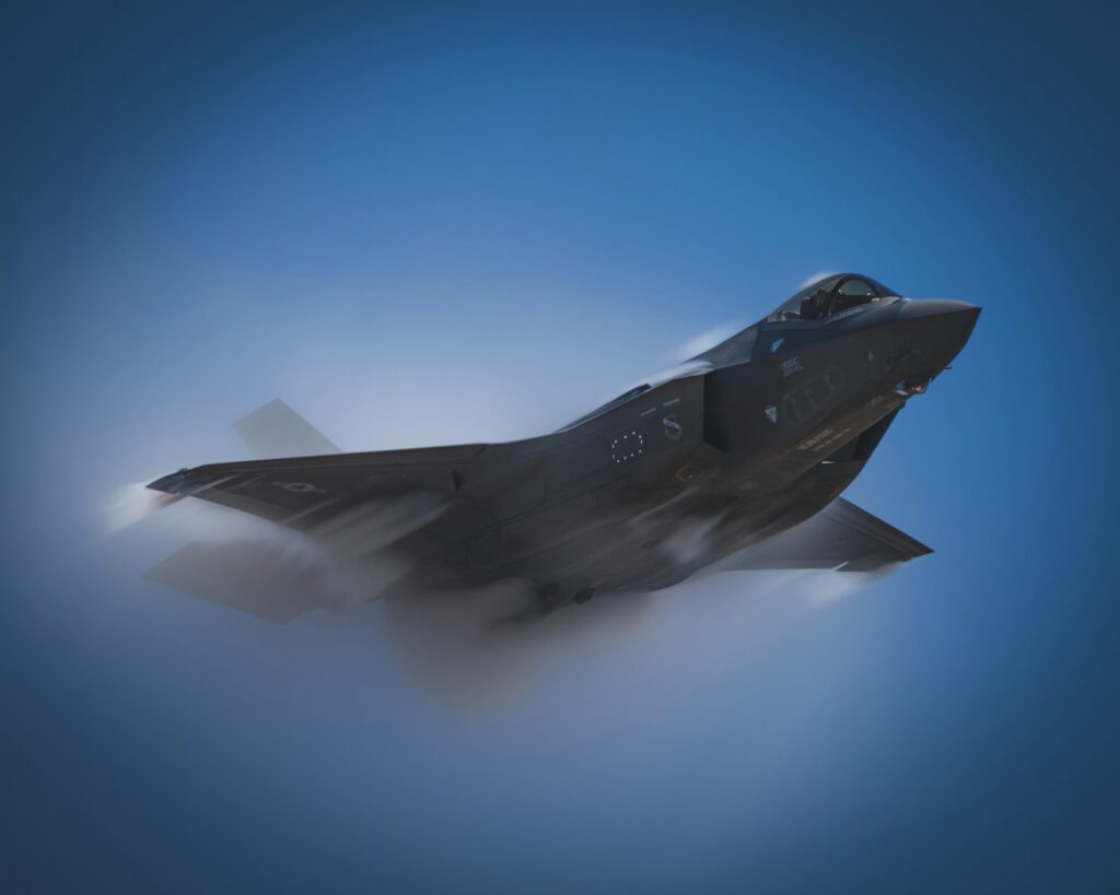 Lockheed Martin’s Shift Signals a New Era of Enterprise Leadership a fighter jet flying through a blue sky