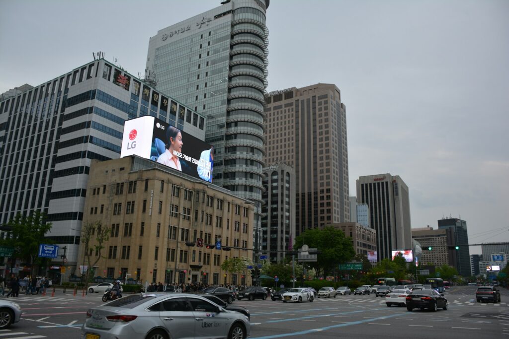 Cityscape with tall buildings and traffic.