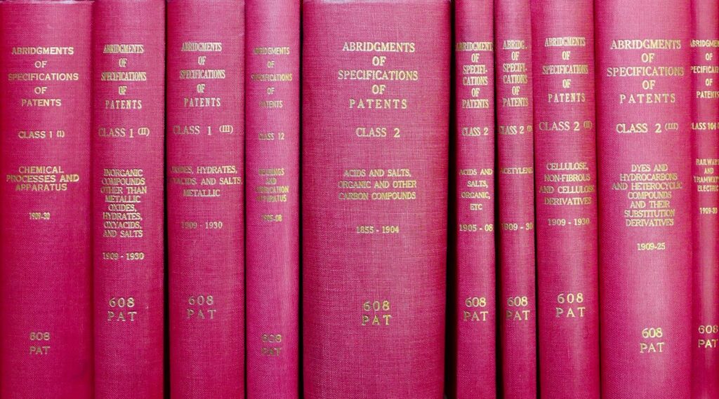 What New Online Safety Laws Mean for Future of AI A row of red hardcover books titled