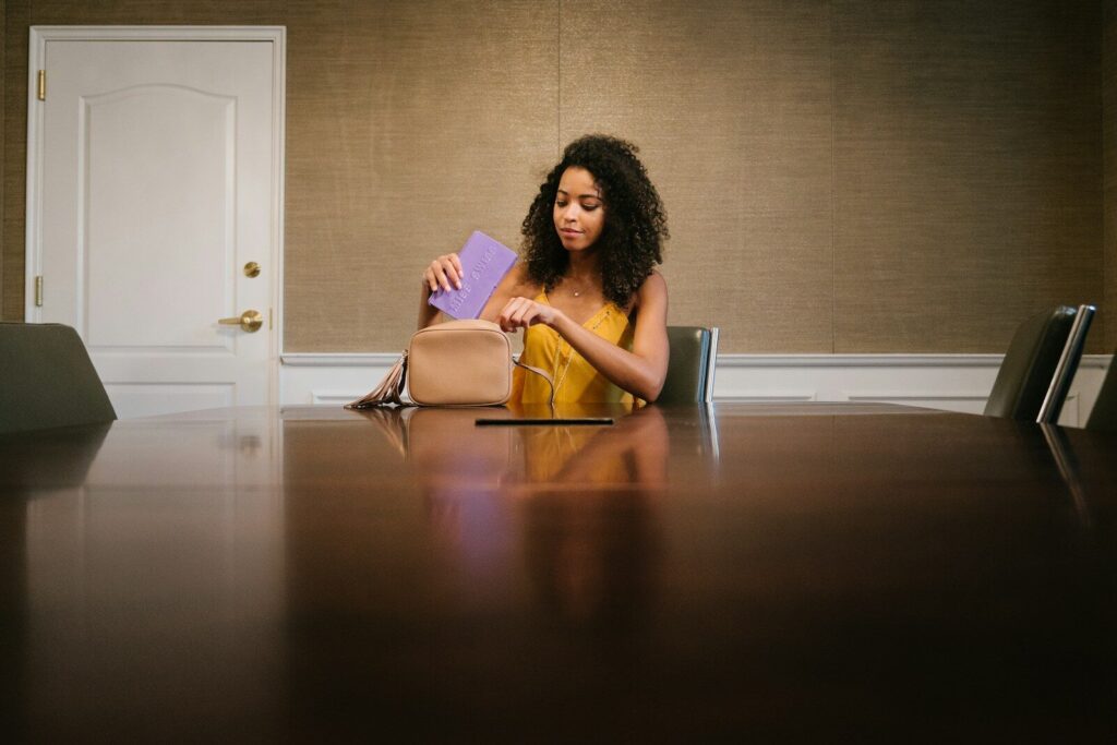 Why Tech Industry’s Fastest Revolution Is Meeting New Resistance woman in pink sleeveless dress sitting on chair