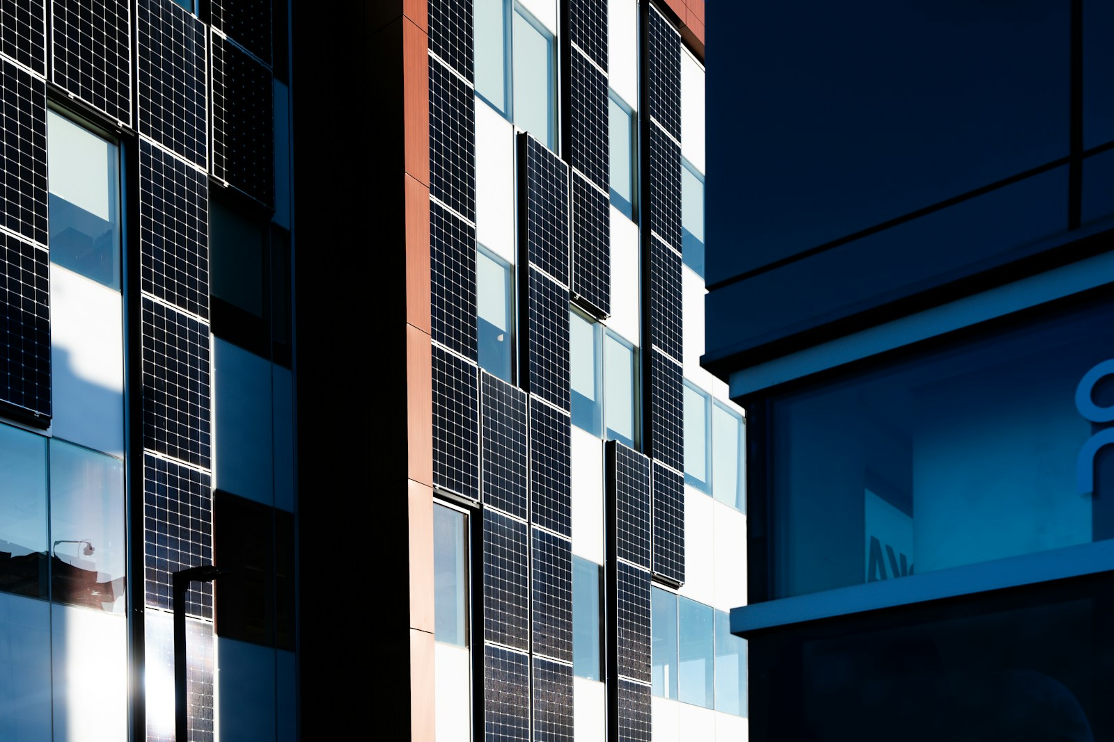 Modern building facade with solar panels