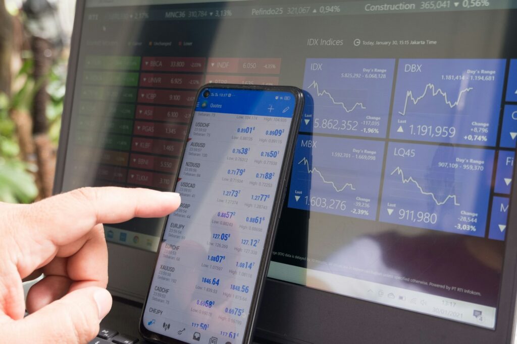 Why Software Stocks Are Getting Crushed and What This New Reckoning Really Means for the Tech Economy black android smartphone turned on screen