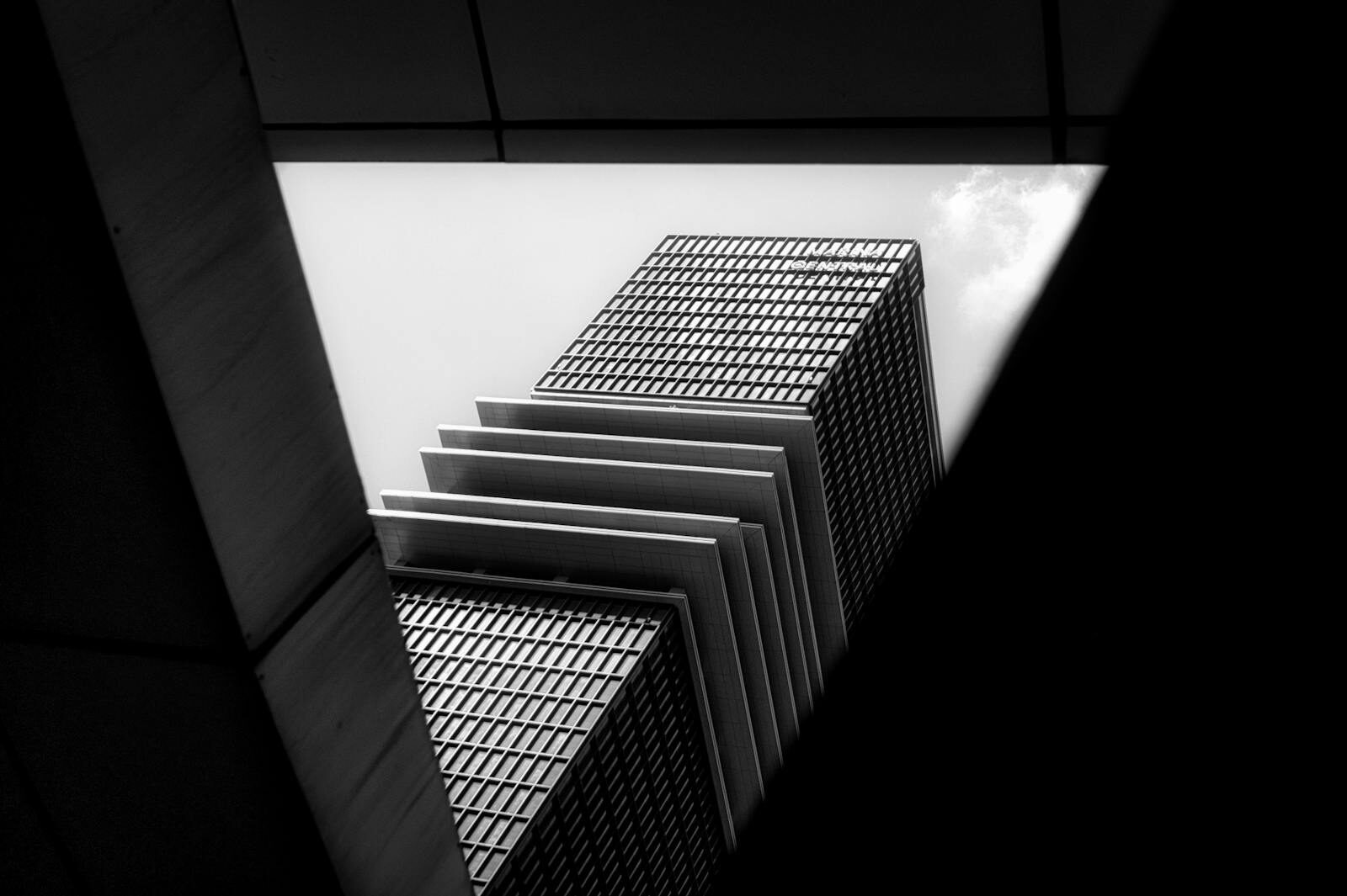 A striking black and white photo of modern architecture in Ho Chi Minh City, Vietnam.