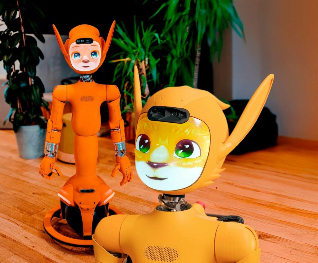 Two orange robots with animal-like features.