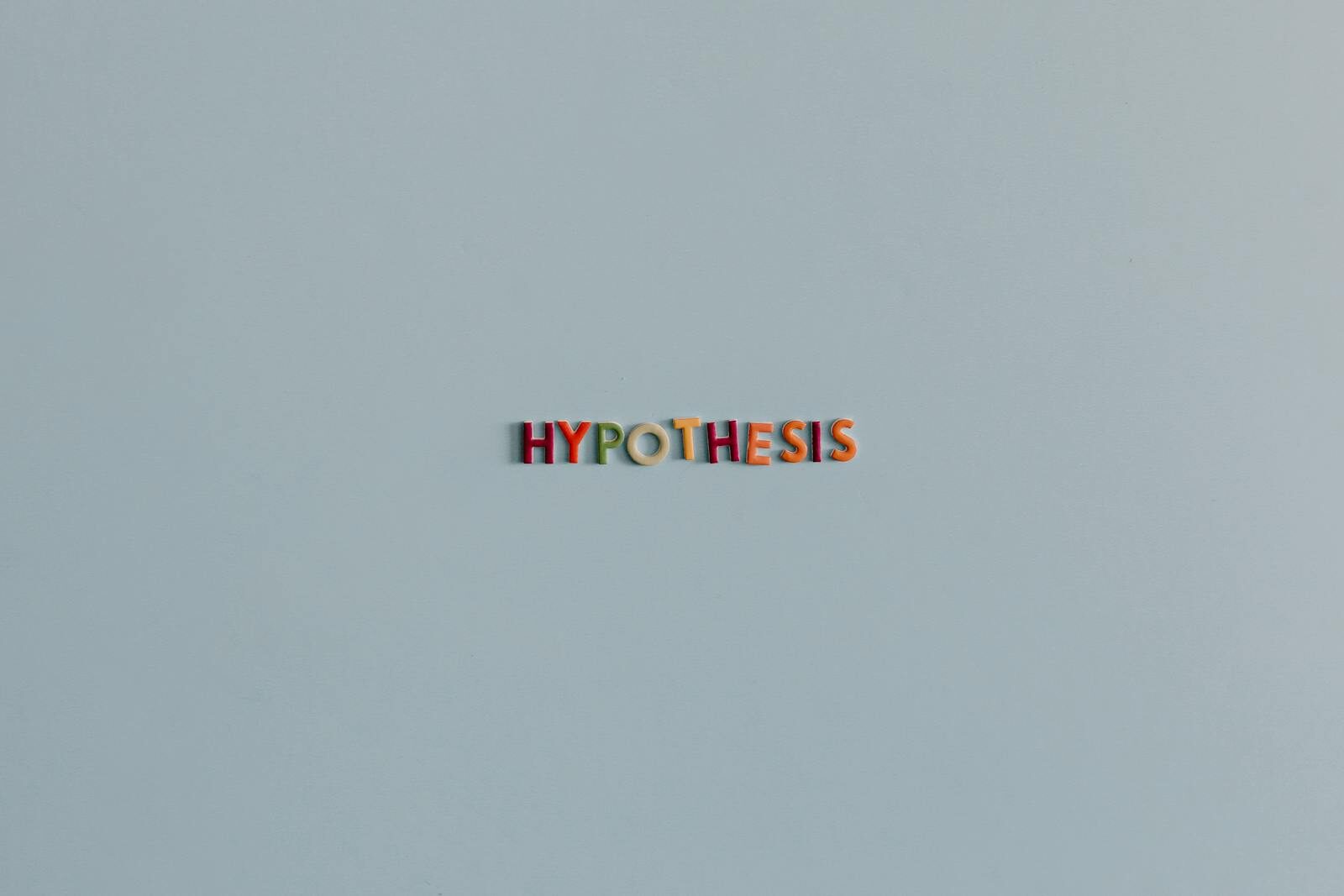 Why New Tech Giants Preach Ethics While Racing Dominate Future Minimalist image with colorful letters spelling 'Hypothesis' on a light background.