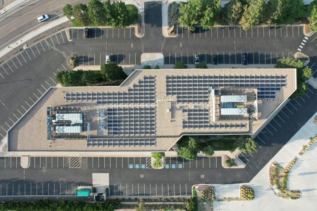 an aerial view of a parking lot and a parking lot