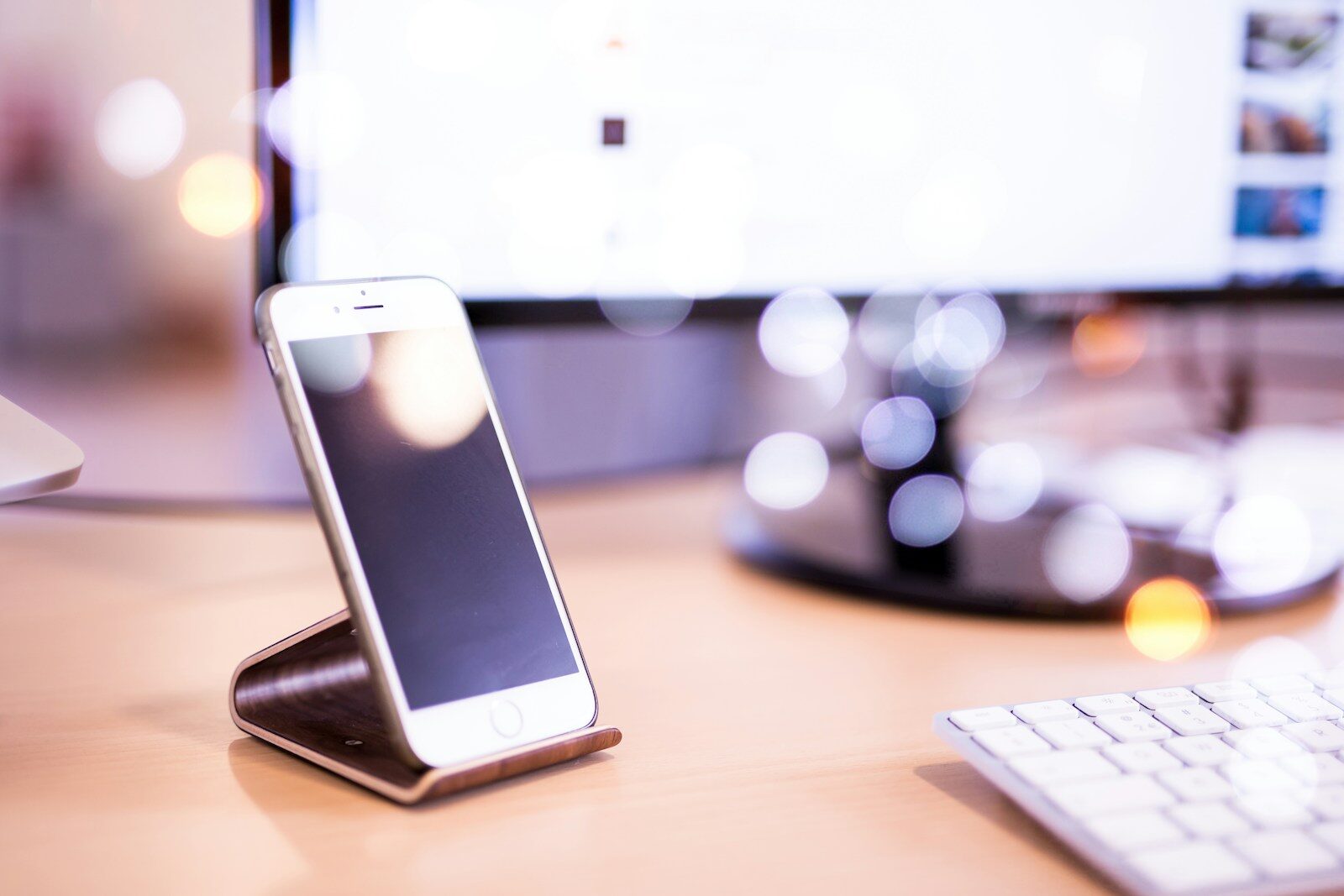 OpenAI’s Hiring Surge: Why Doubling Its Workforce Signals a New Phase in the Global AI Power Struggle shallow focus photography of iPhone on stand