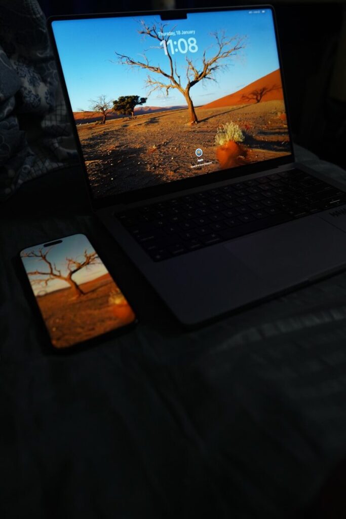 How Rivalries Between Tech Titans Are Defining New Future Intelligence A laptop computer sitting on top of a bed