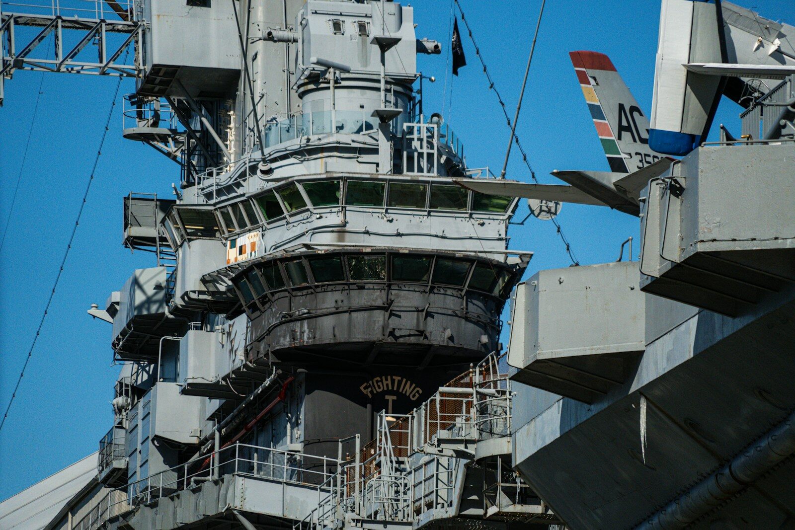 a large airplane sitting on top of an aircraft carrier