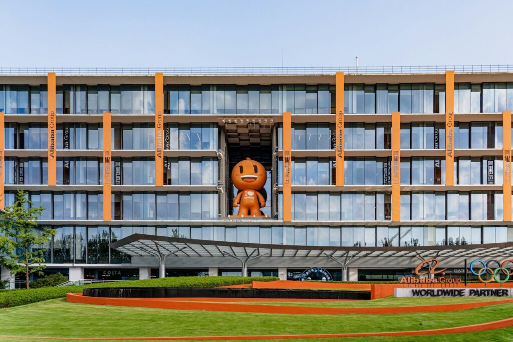 Alibaba’s New “HappyHorse” AI Just Raised the Bar for Video Generation a large building with a giant orange object in the middle of it