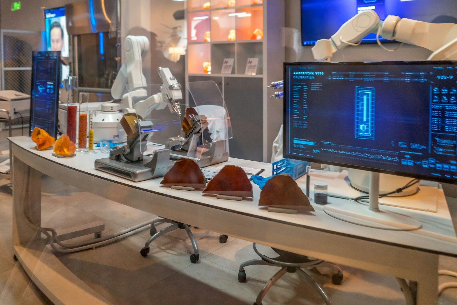 a desk with a monitor and a keyboard on it