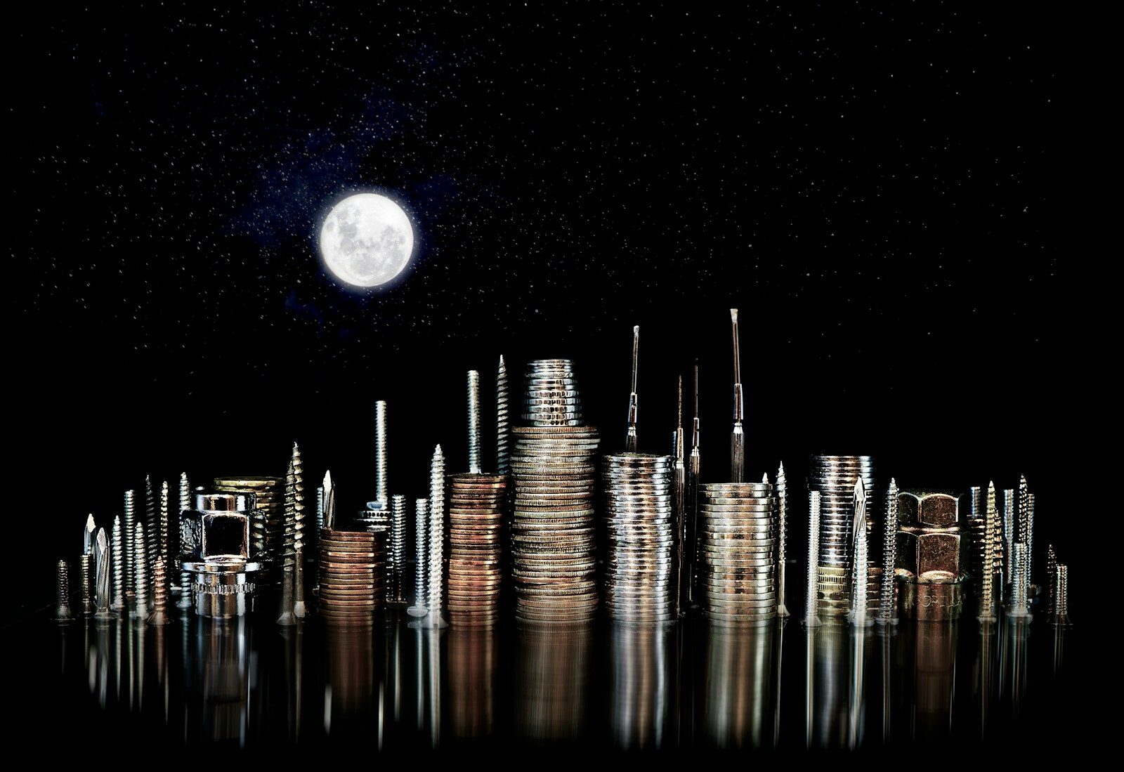 Cityscape made of coins under a full moon.