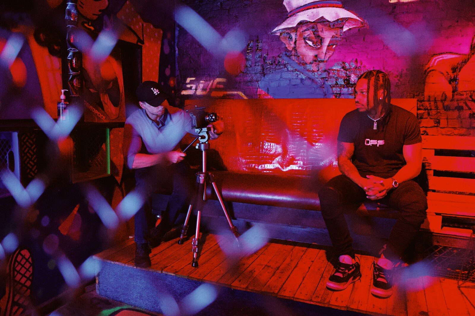 Why AI Startups Spending Huge Money on New Hype Videos man in red crew neck t-shirt sitting on chair