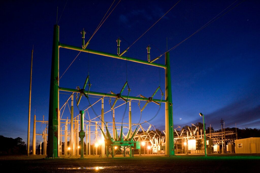 Why Big Tech Race Electricity Is Reshaping America’s Electric Grid green and grey transmission tower during nighttime