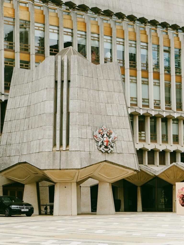 a large building with a clock on the side of it