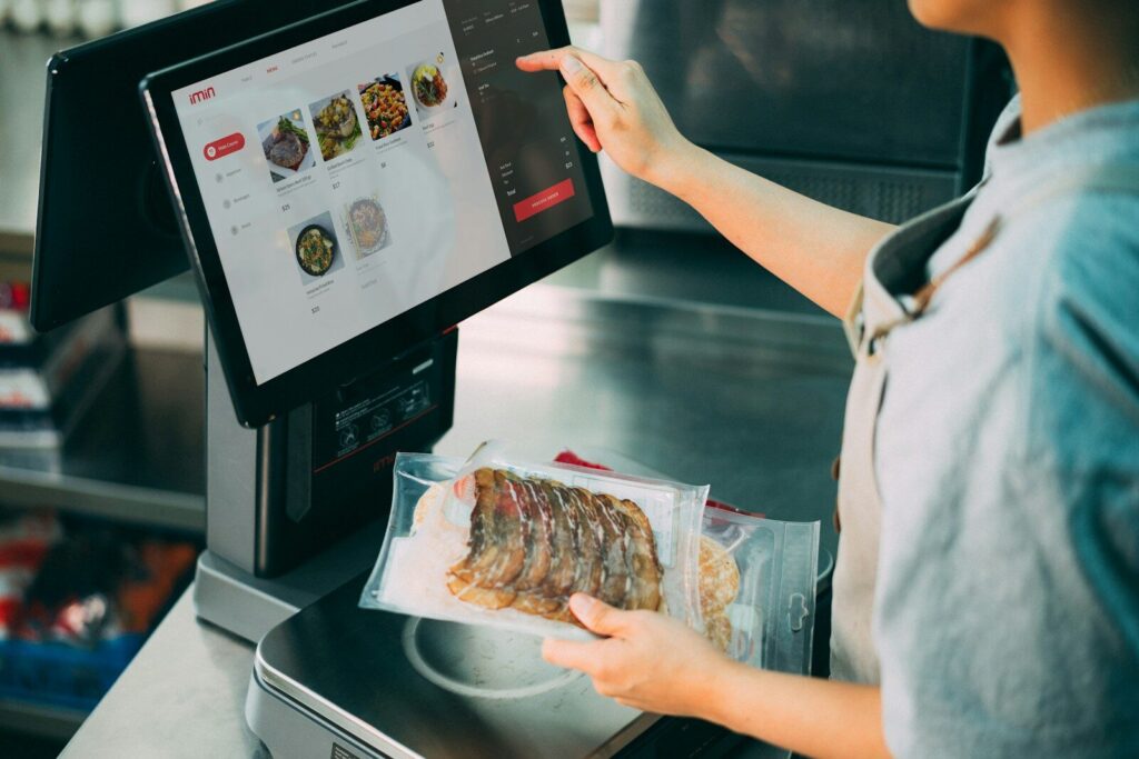 How AI Surveillance Quietly Changing What Pay for New Groceries a person holding a tray of food