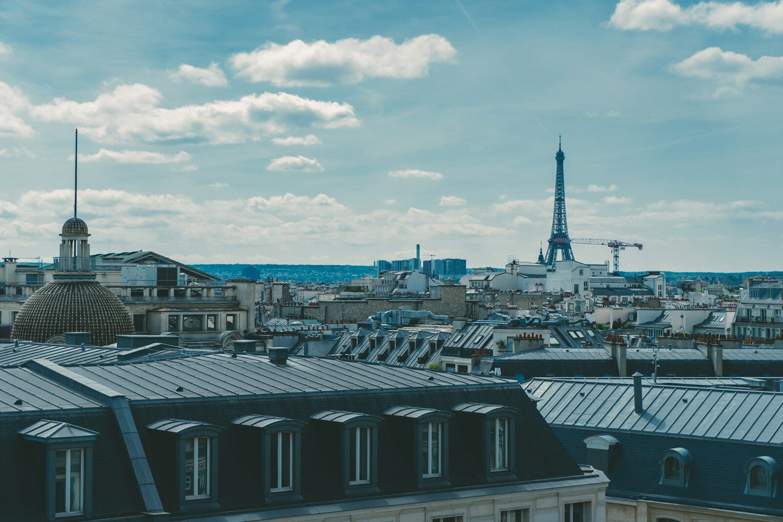 Why France’s Mistral Is Challenging America’s Dominance in New AI a view of the eiffel tower from the roof of a building