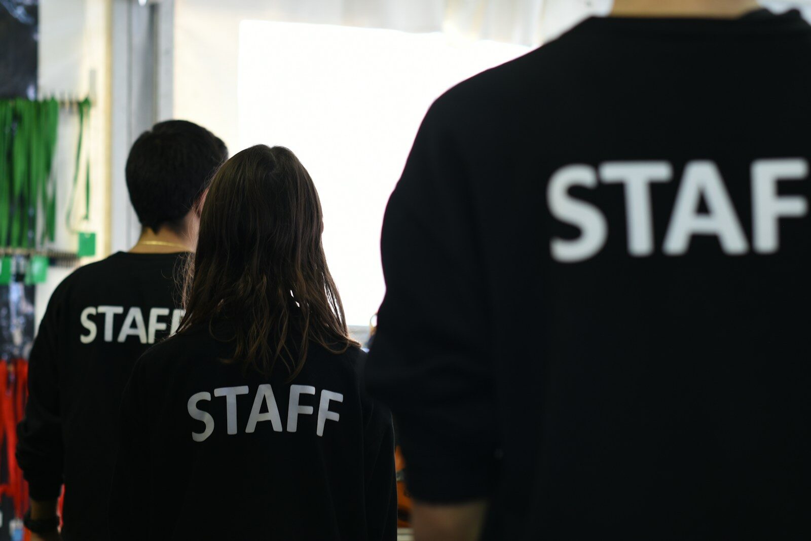 Why Tech Giants Cutting Jobs While Spending Billions New AI a group of people in black shirts standing in a room