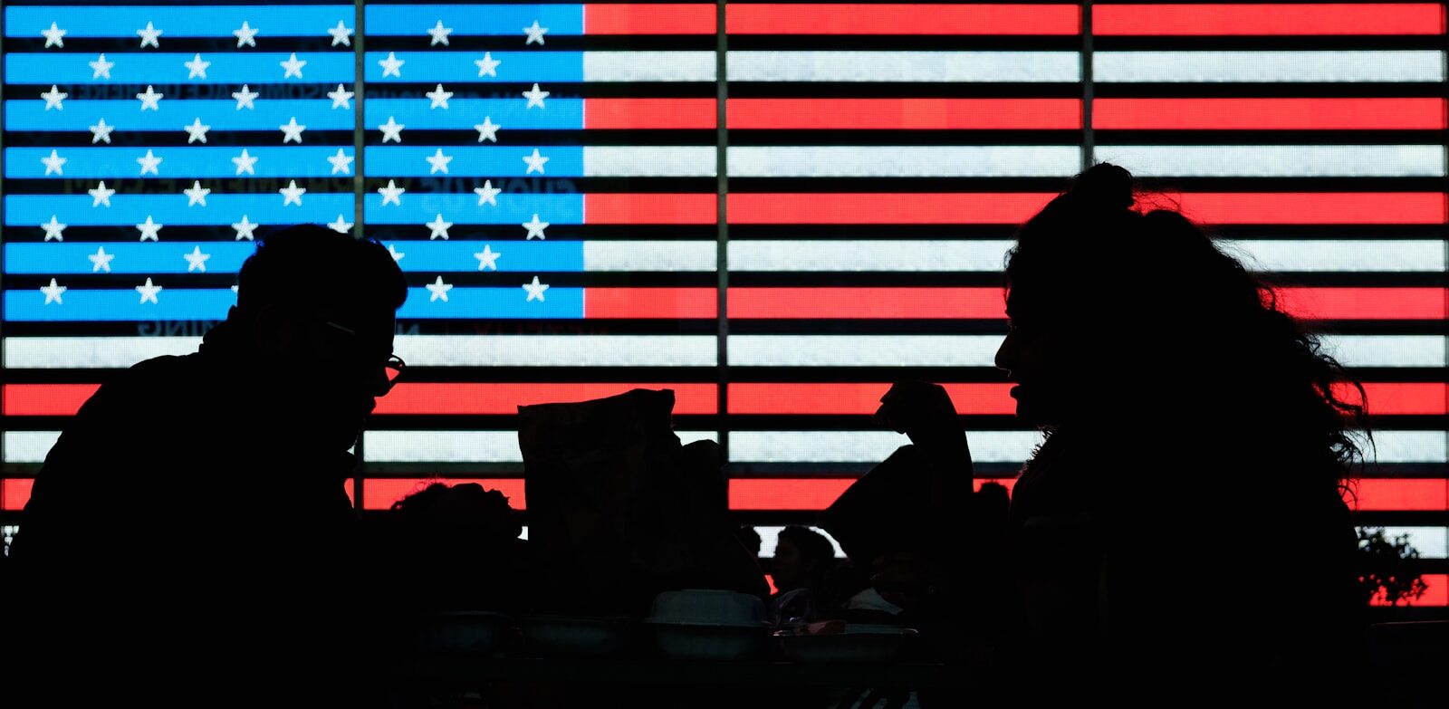 Trump’s New AI Order Signals Major Shift America’s Tech Strategy silhouette of people sitting on chair