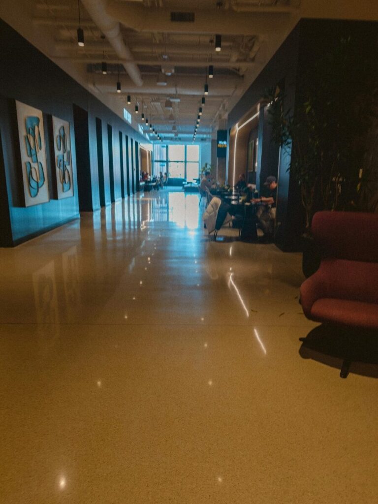 Inside Startup Revolution Redefining New Future of Technology and Power Modern hallway with seating areas and artwork