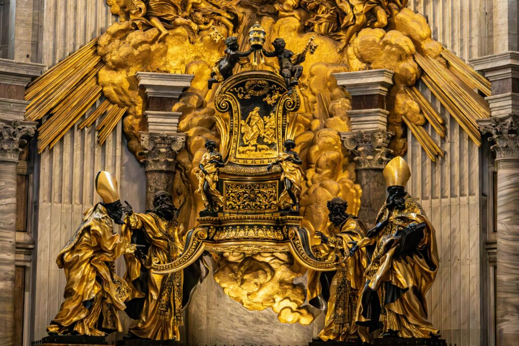 The Vatican Is New Warning About The Soul We Lose Along the Way. Intricate Baroque sculpture with golden details inside St. Peter's Basilica.
