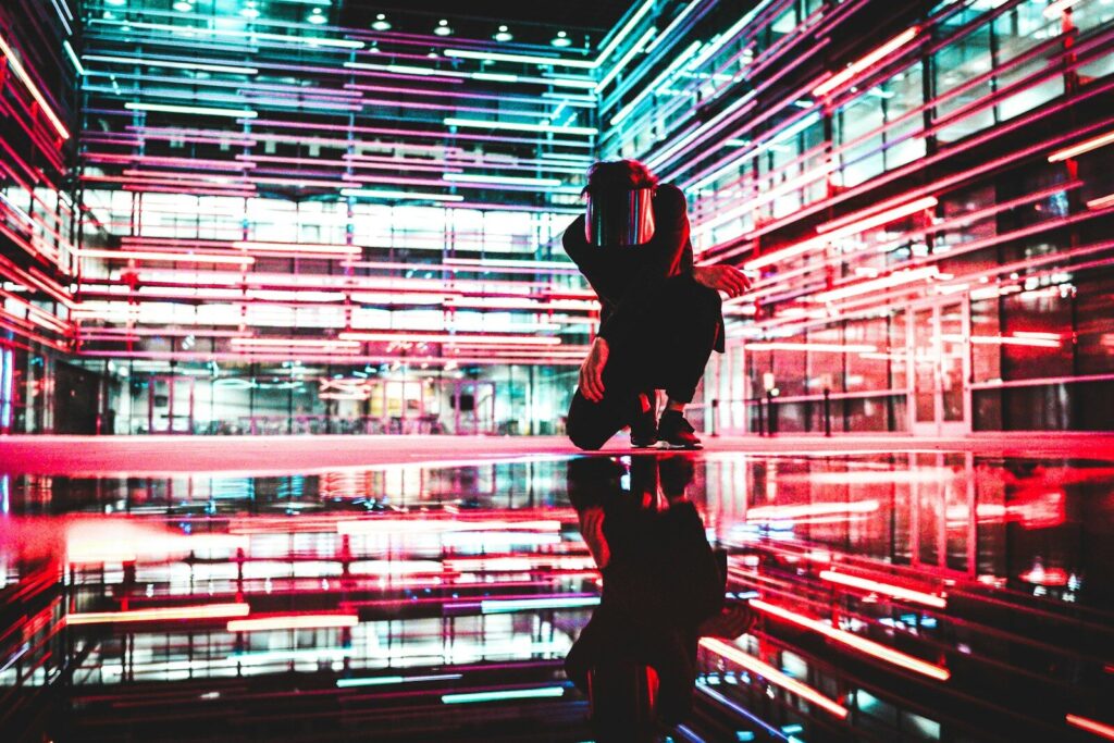 AI Is not “Taking” Your New Job — It’s Rewriting Job Itself person kneeling inside building