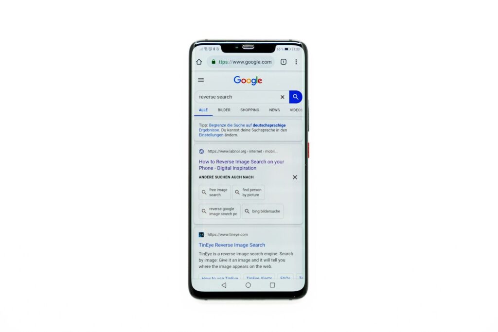 Google AI Search Under Attack And Internet New Manipulation War black Android smartphone
