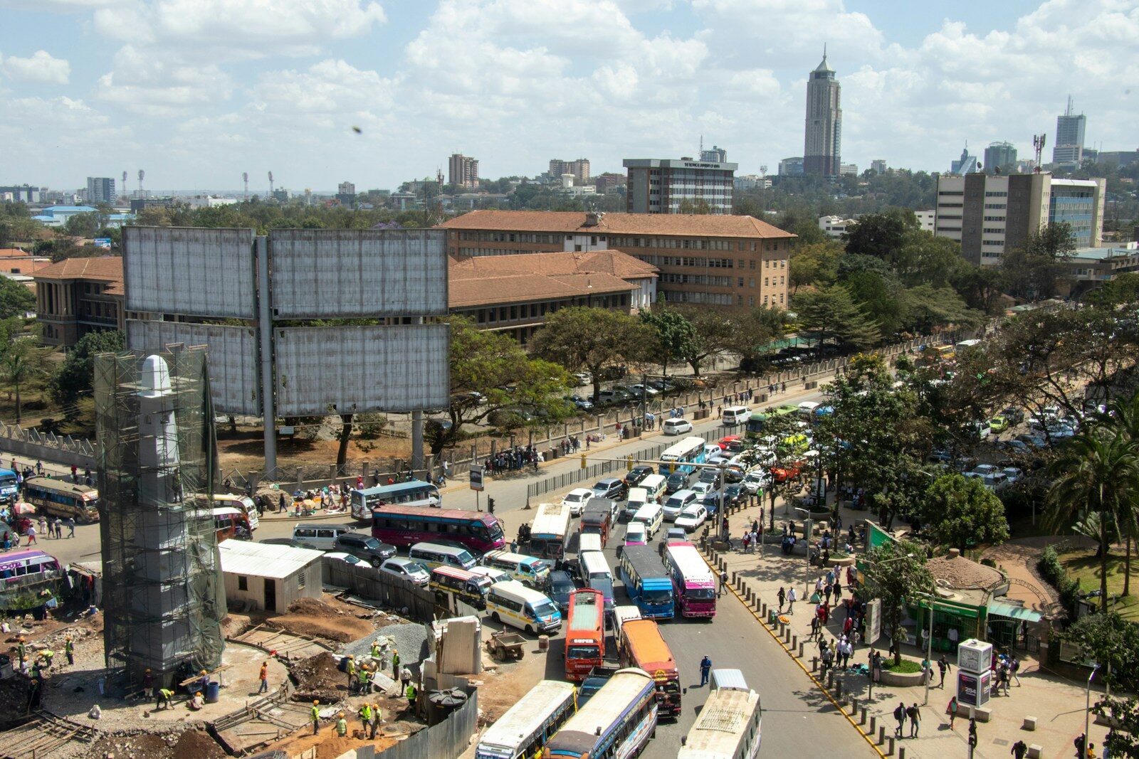 How Kenya’s Digital Health Revolution Is Pricing Out the Poor a parking lot full of cars