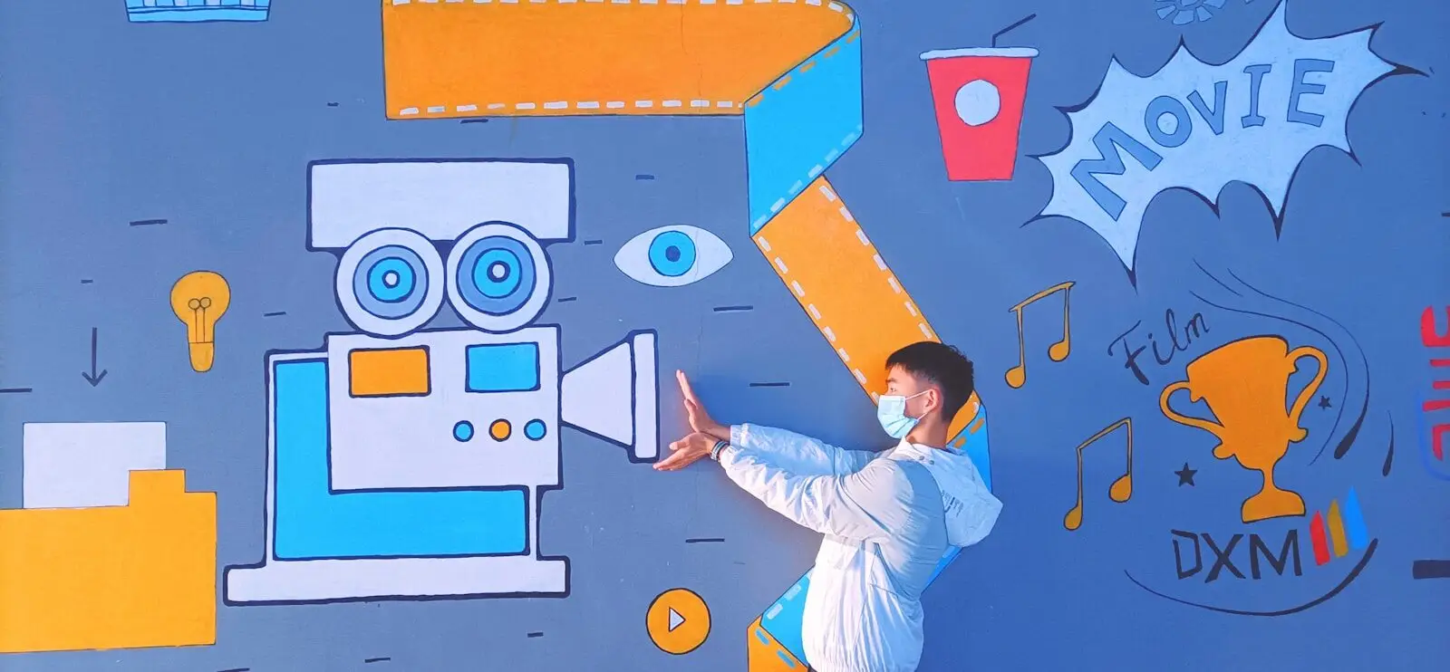 “AI-Washing” Is Exploding New Across Corporate And Consumers Starting Notice boy in white long sleeve shirt and blue pants standing in front of wall with painting