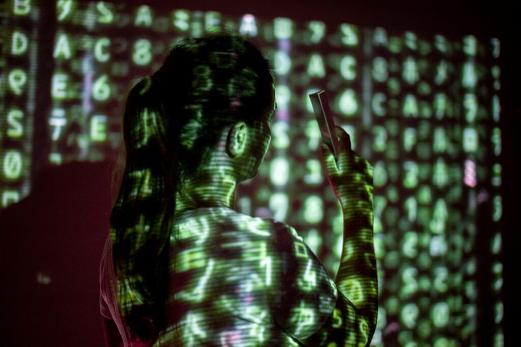 Why the Global AI Race Is Becoming New Cybersecurity Battle a person with long hair playing a guitar