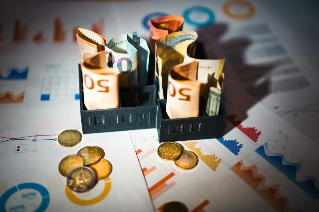 A pile of money sitting on top of a table