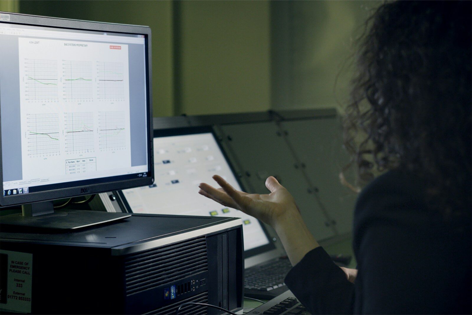 The Hidden Human Labor Powering the New AI Revolution person using computer on table