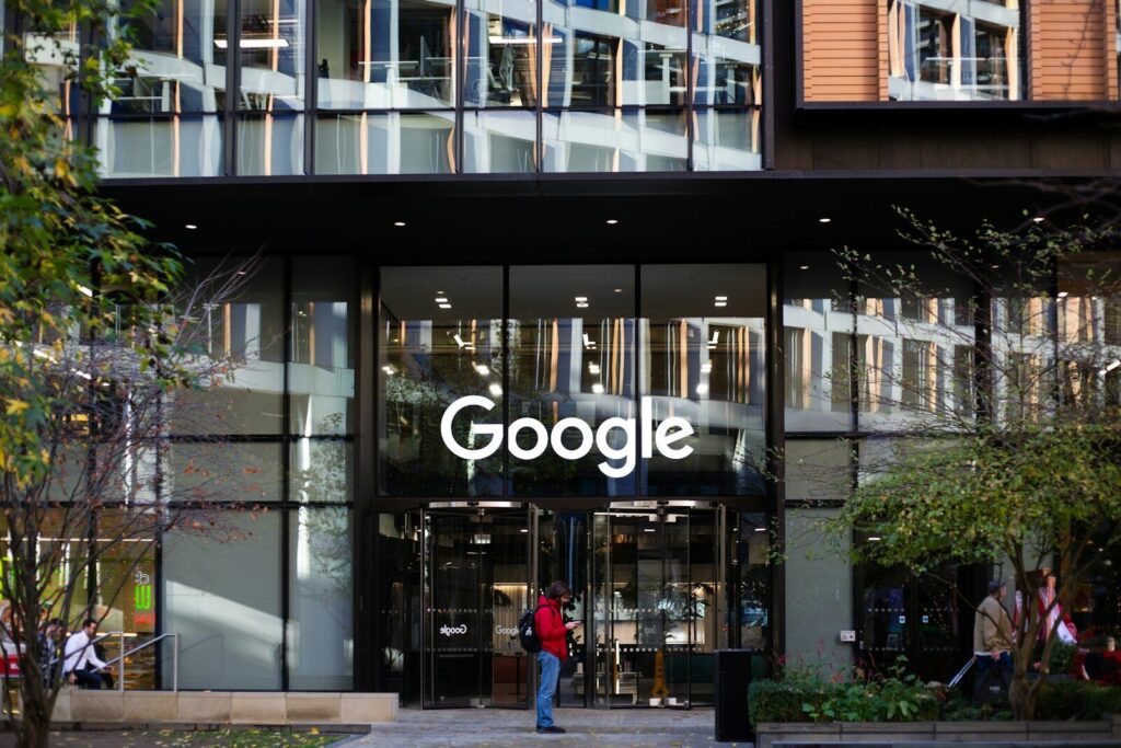What It Reveals About New True Cost of AI Revolution a man standing in front of a google building