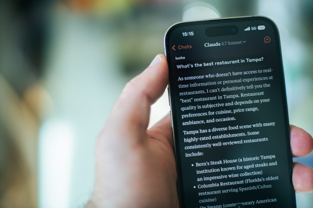 Why Anthropic's Warning Signals New Era AI National Security Risks A person reads restaurant recommendations on their phone.