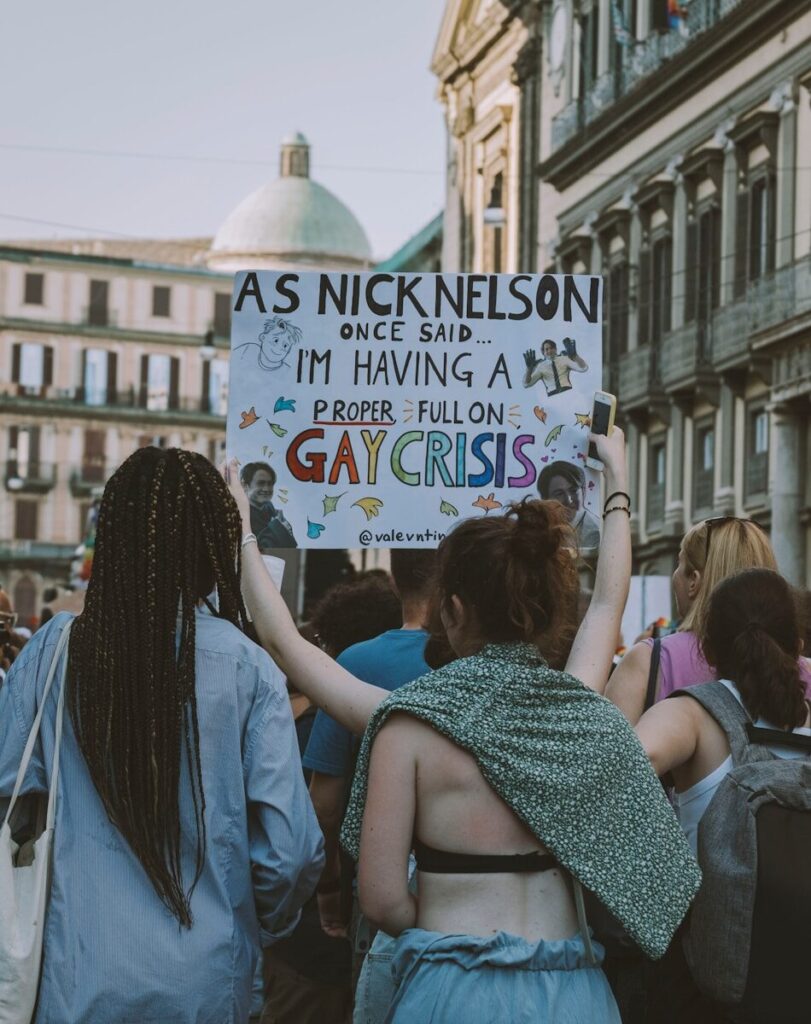 a group of people holding a sign