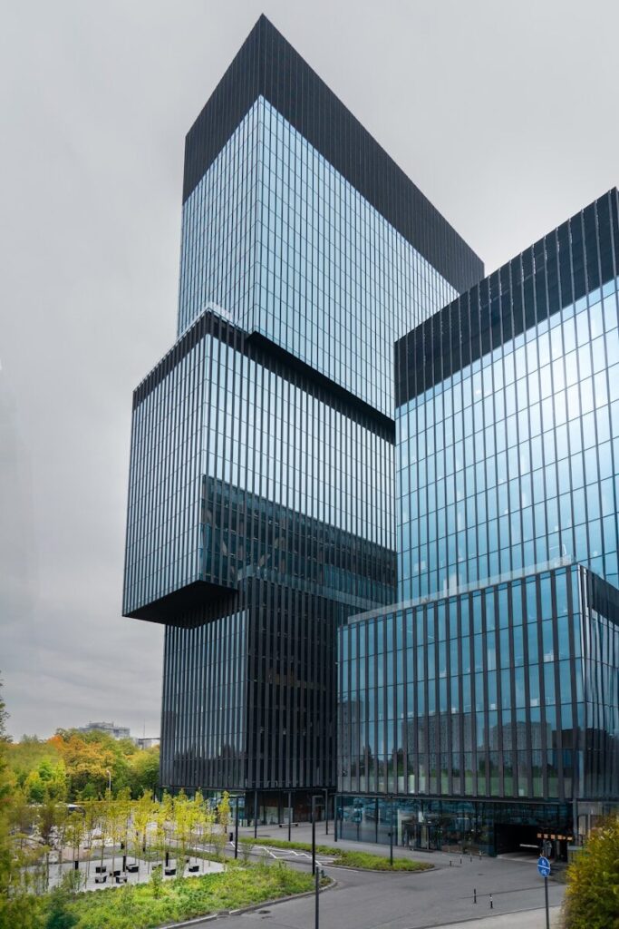 Why Employment Impact Looks Like New Internet Revolution a couple of tall buildings sitting next to each other