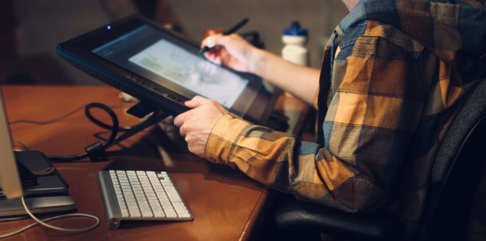 Why Employment Impact Looks Like New Internet Revolution person in brown and black plaid long sleeve shirt using black laptop computer