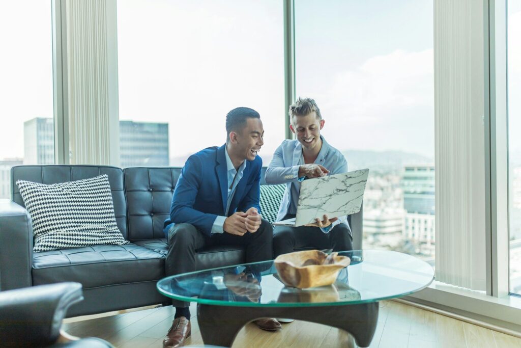 Why Physical AI Is Becoming Next New Trillion-Dollar Opportunity two men in suit sitting on sofa