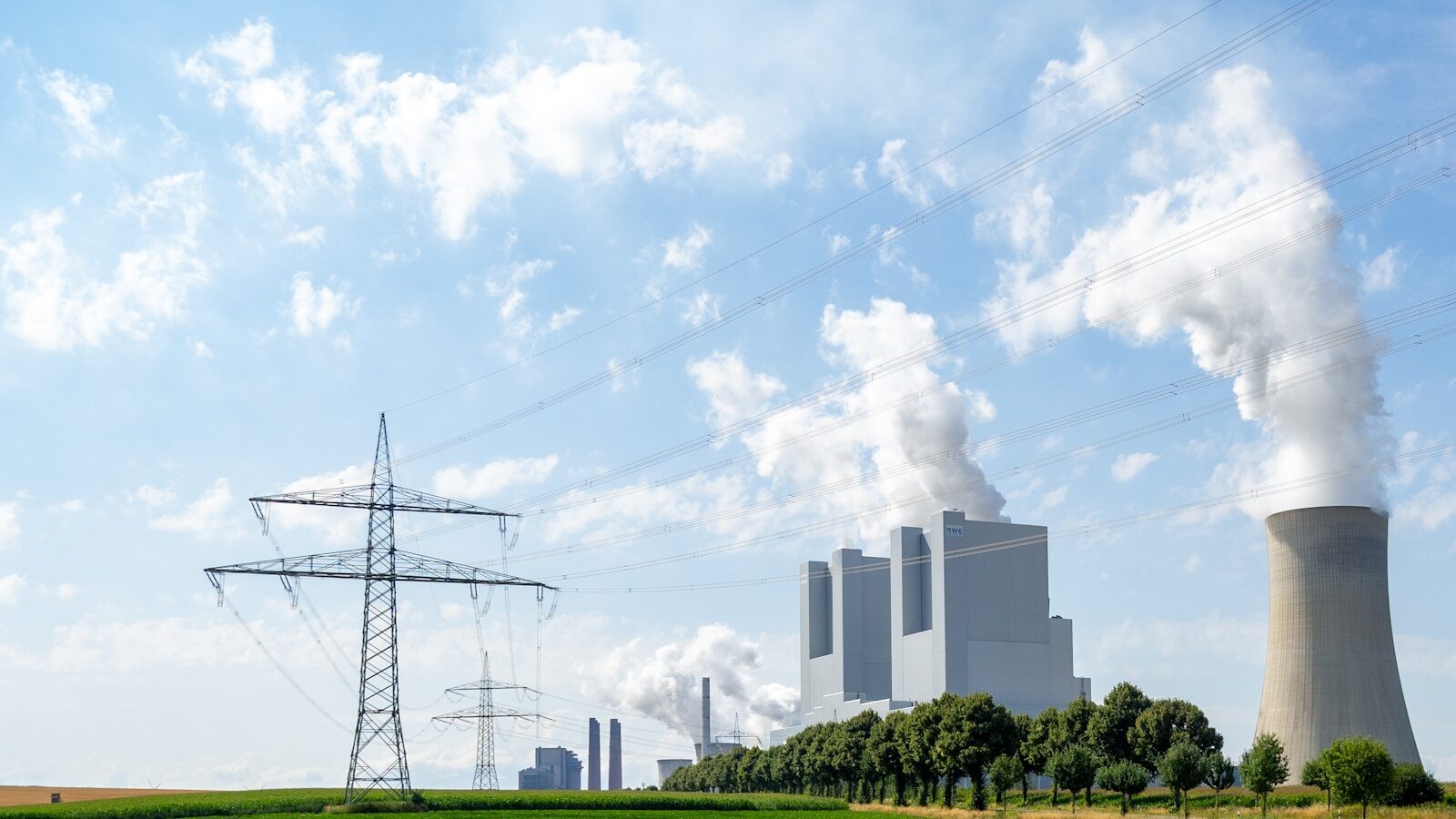 Why Fast-Tracked Power Plants Are Reshaping America's New Energy Future power lines and towers