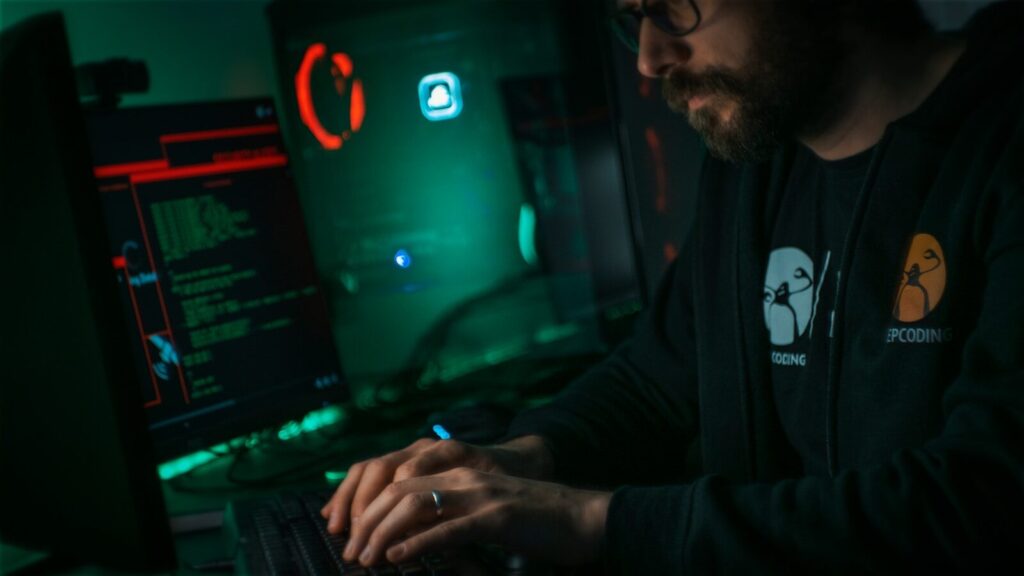 Why the Global AI Race Is Becoming New Cybersecurity Battle man in black jacket using computer