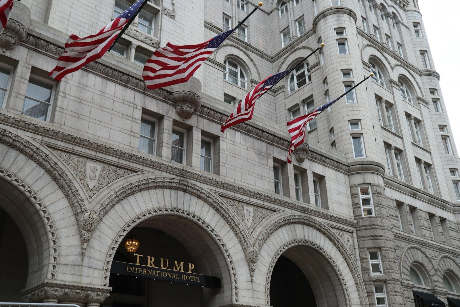 Why the Departure of Trump's New Top AI Adviser Matters a building with flags on the front